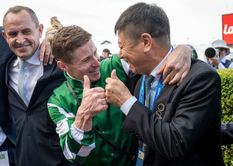 James McDonald and Mr Zhang after Via Sistina (IRE) wins the G1 W.S Cox Plate at Moonee Valley